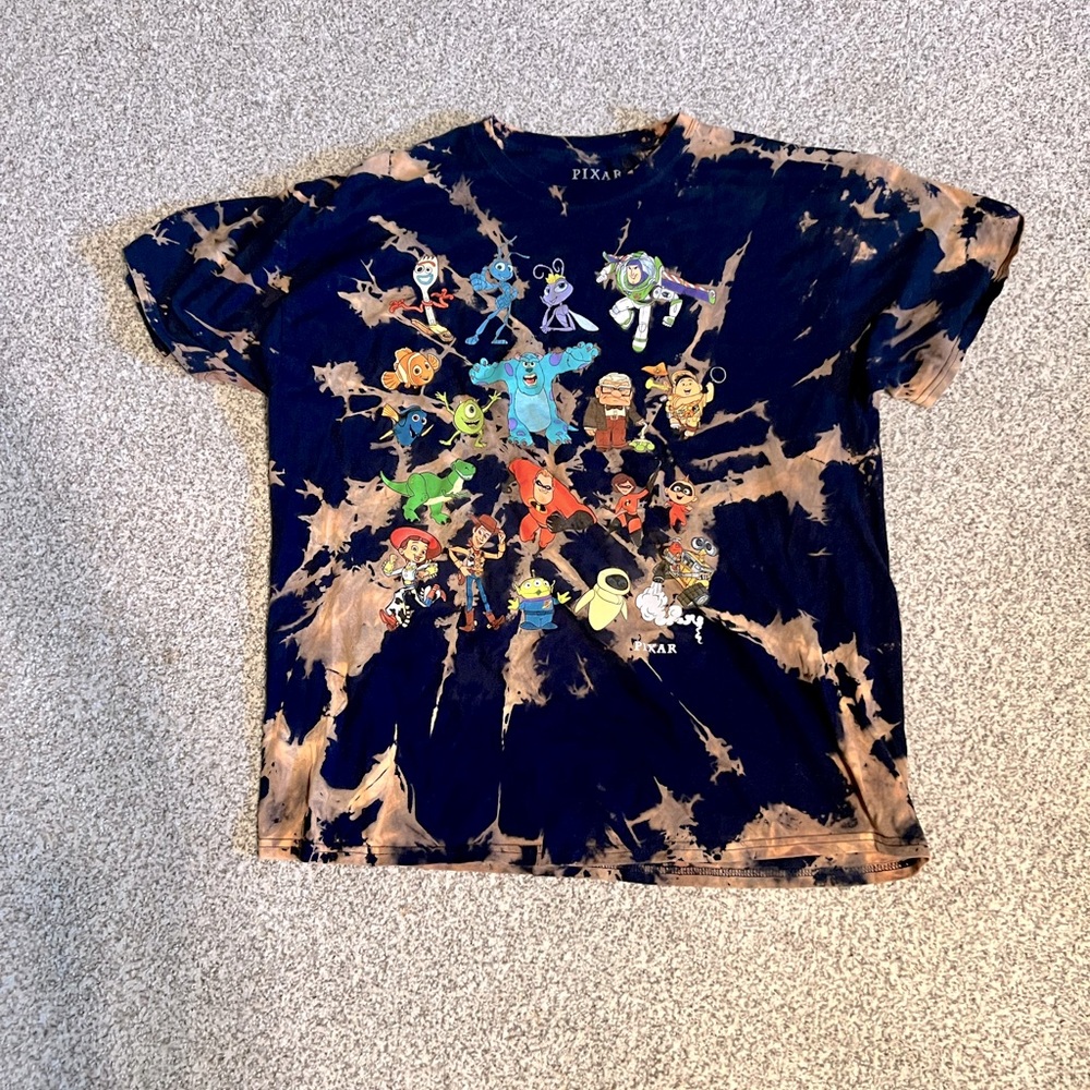 Disney Pixar T-shirt size extra large with Toy Story and monsters inc, etc